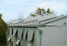 House with angled solar panels on the roof