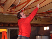 Worker installing tubing