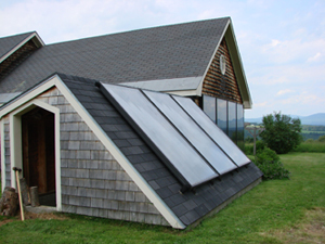 Solar collectors on a low shed roof