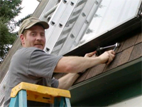 Worker installing solar panels